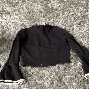 Black crop top with ruffles